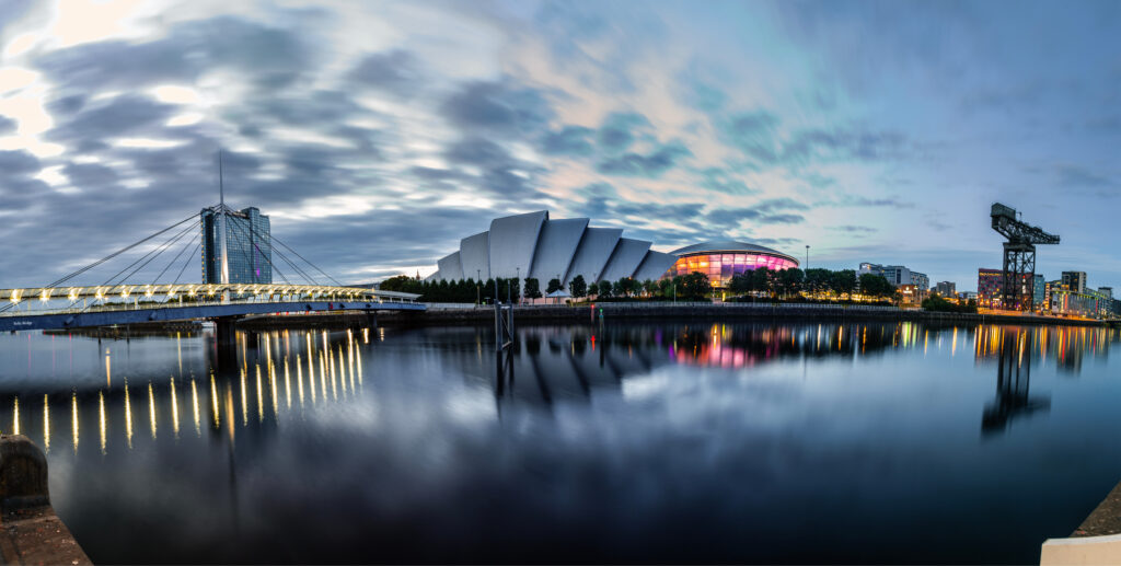 A View of the Glasgow Skyline showcasing multiple landmarks and there reflection in the water
